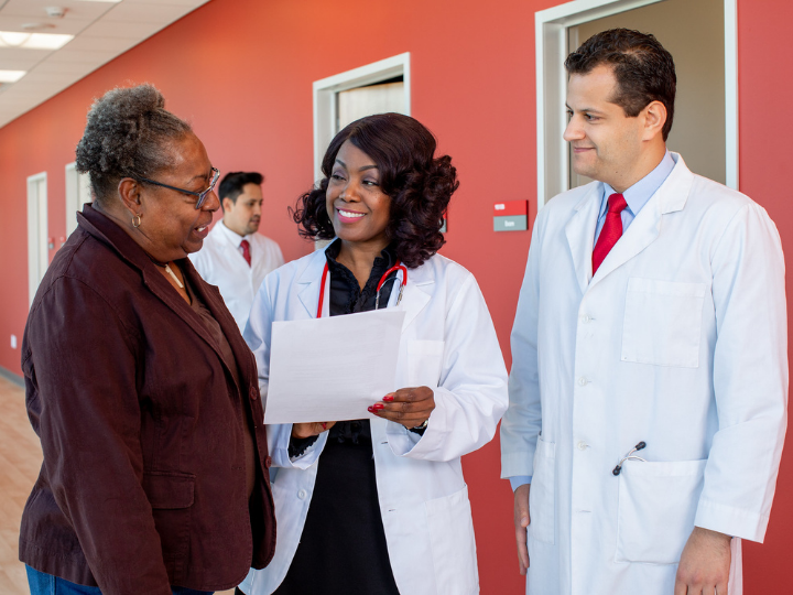 Doctors with patient Doctors with patient