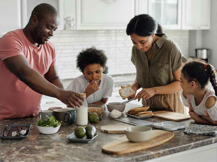 Photo of family enjoying food time Photo of family enjoying food time