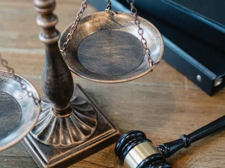 Photo showing scale of justice and judge’s gavel Photo showing scale of justice and judge’s gavel