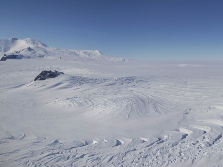 Photo of Antarctica’s Pope glacier, with Mount Murphy in background