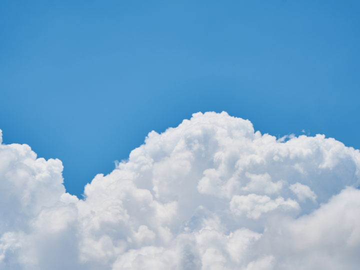 Clouds in front of a blue sky