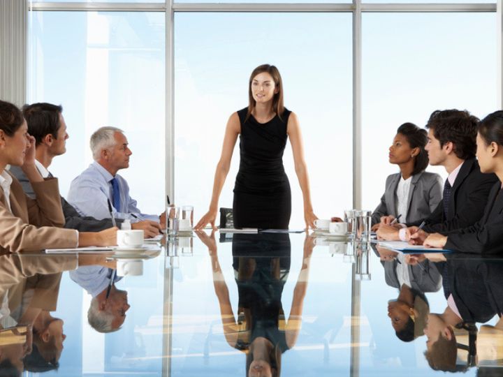 Woman leading a meeting Woman leading a meeting