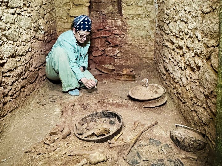 Diane Chase in tomb at Caracol