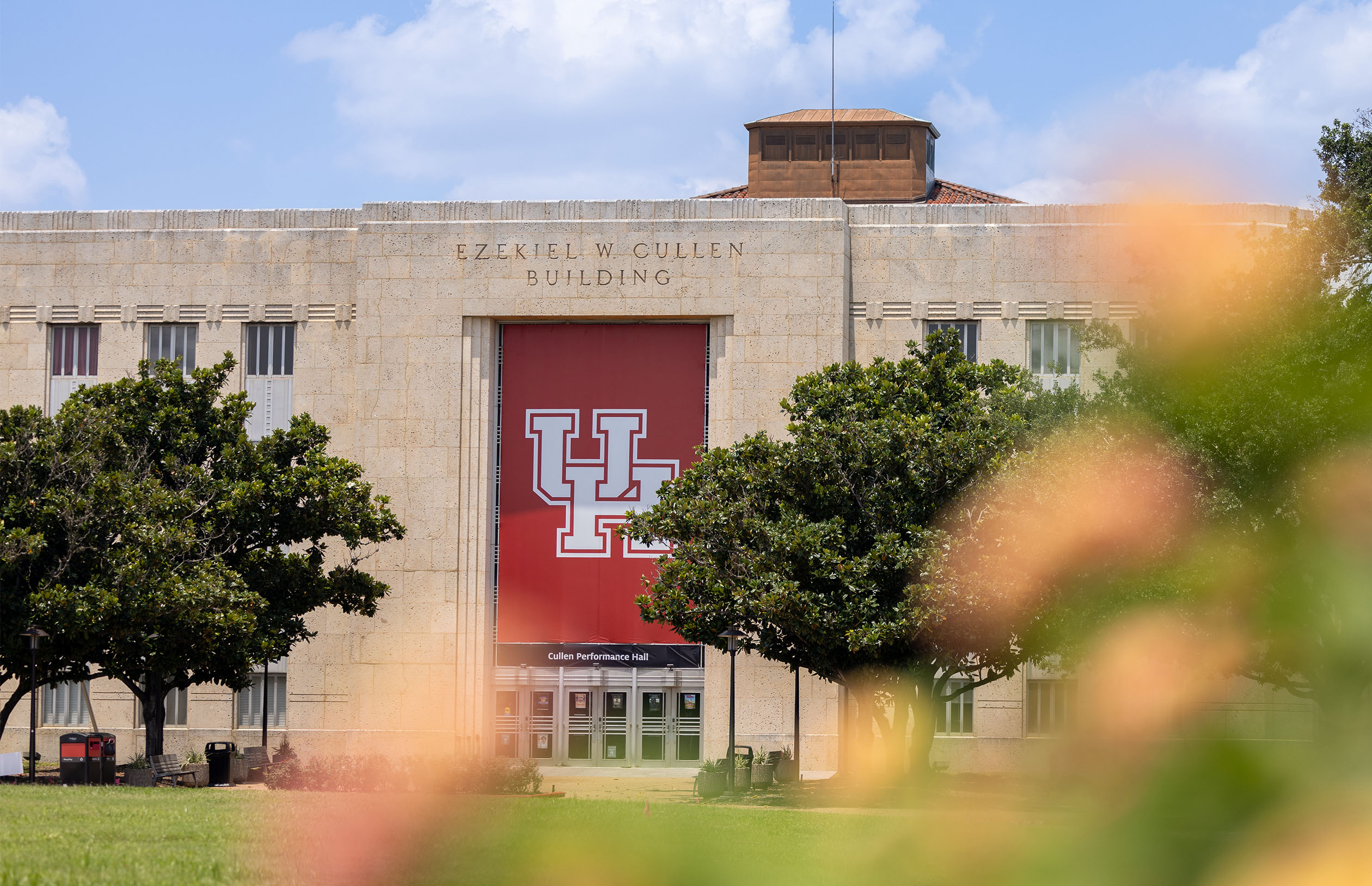 UH banner hanging on the outside of the University of Houston’s Cullen Performance Hall.