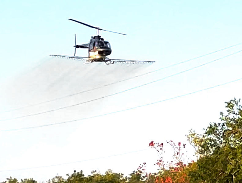 Helicopter Spraying Herbicide