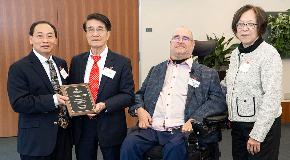 Zhifeng Ren, Paul Chu, Kevin Bassler (Physics Chair) and May Chu