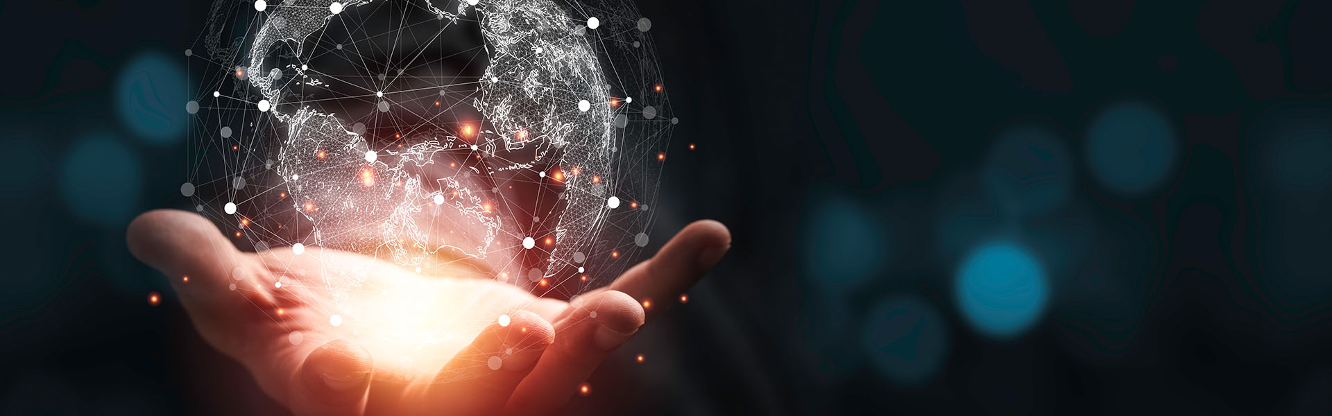 human hand holding a virtual globe