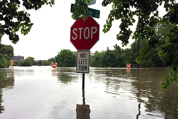 Stop Sign in Flooded Waters