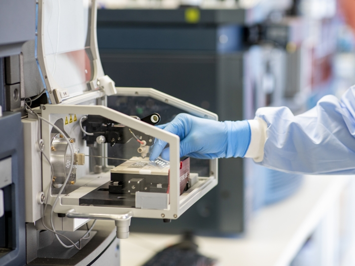 electron microscopy close up on hand with instruments