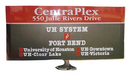 Street signage that says, 'CentraPlex. 550 Julie Rivers Drive. UH System at Fort Bend'