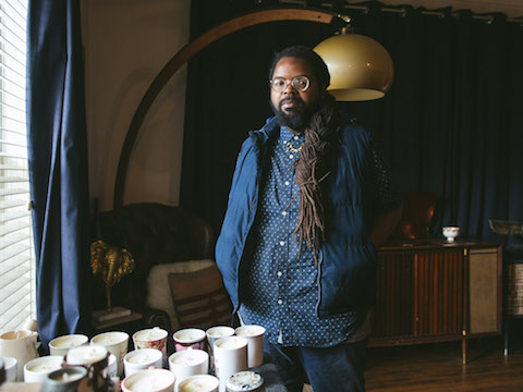 A recent graduate of the UH SURE entrepreneurship boot camp who has started a business selling candles in Third Ward.