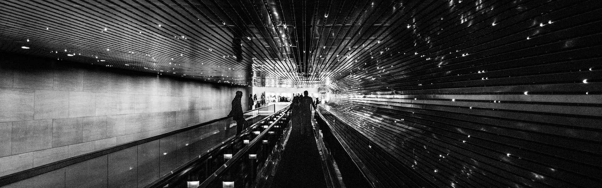 Black and White Image of People Mover